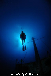 My friend Isidro posing above the shipwreck "Meridian" in... by Jorge Sorial 